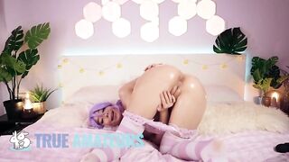 Pretty girl with purple hair fucks her pussy and stimulates her clit at the same time